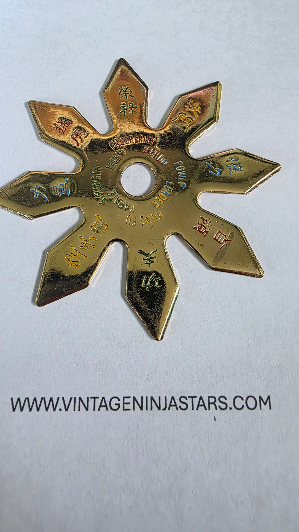 8 POINT GOLD W/ RAINBOW WRITING 3 1/4 INCH TAIWAN Ref 8027