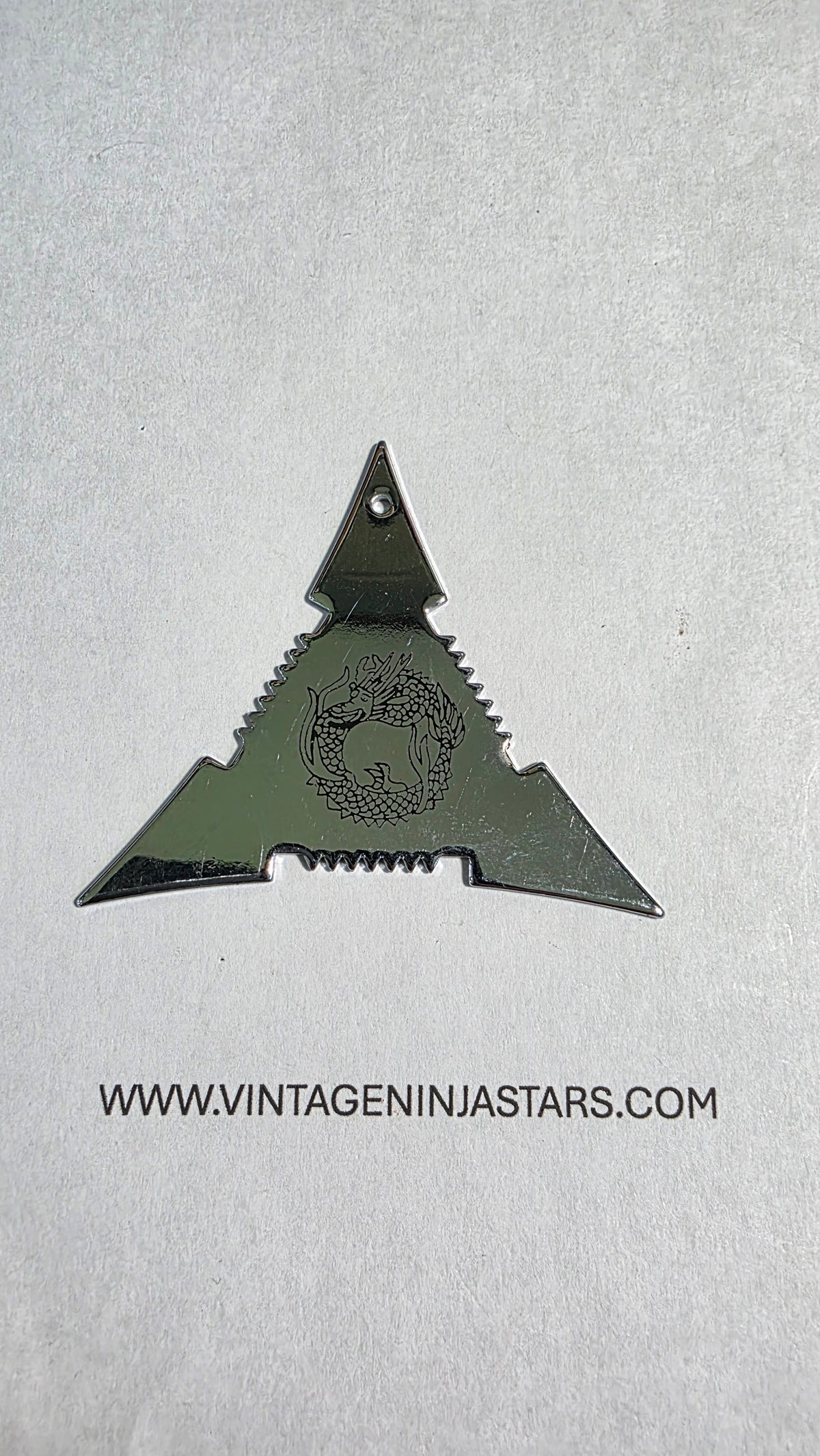 3 POINT SILVER TRIANGLE WITH DRAGON DESIGN Ref 3005