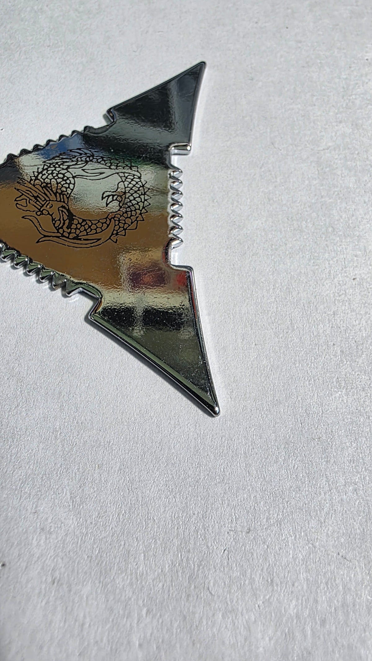 3 POINT SILVER TRIANGLE WITH DRAGON DESIGN Ref 3005