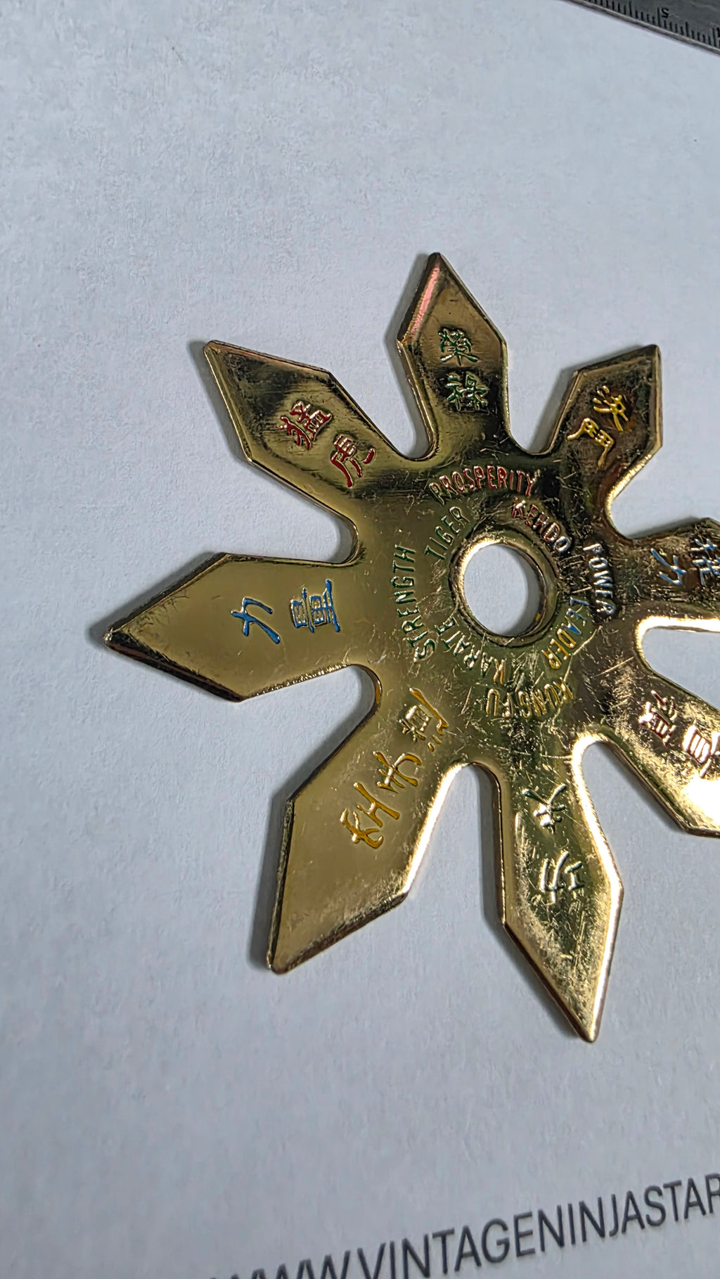 8 POINT GOLD W/ RAINBOW WRITING 3 1/4 INCH TAIWAN Ref 8027